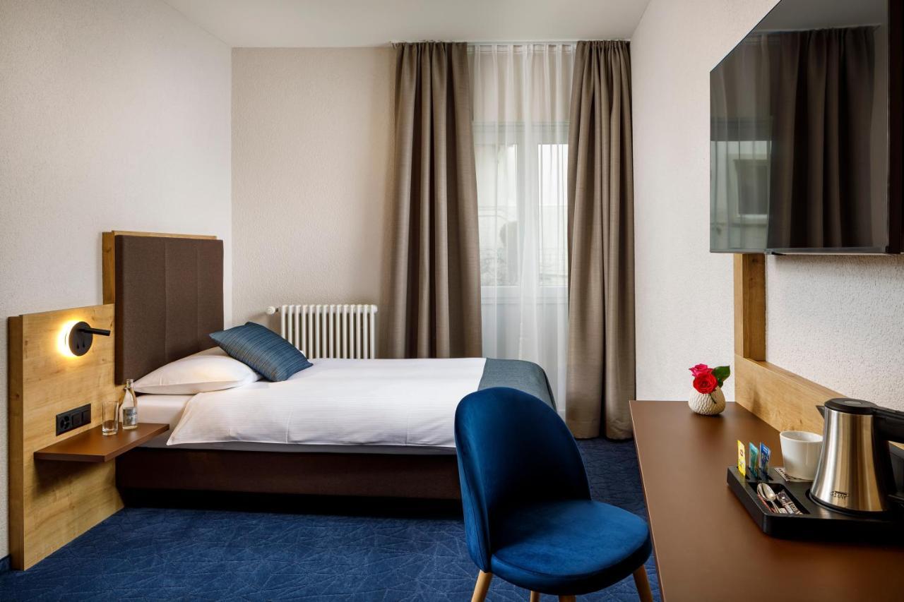 Hotel Tivoli Шлирен Экстерьер фото